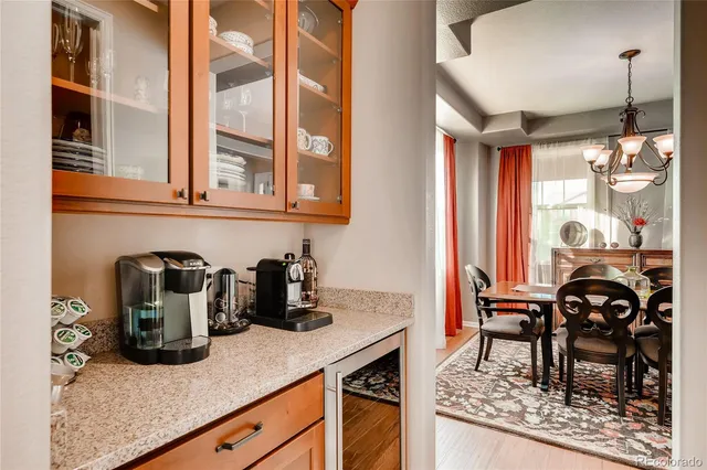 a kitchen with a table and chairs in it