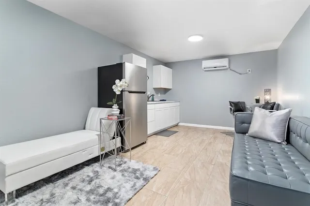 a bedroom with a bed and furniture