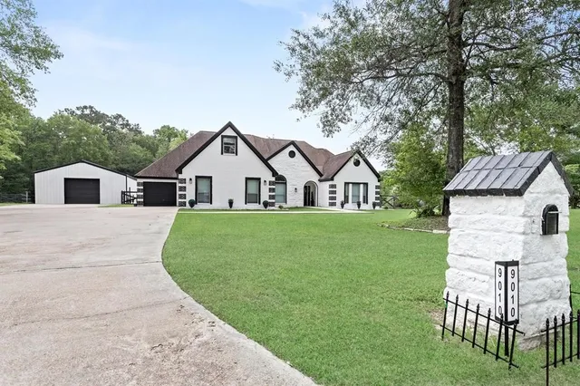 a view of house with garden