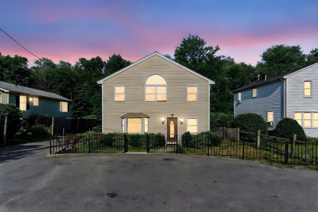 18 Holly Road Holbrook, MA 02343 - Photo 21 of 28 a front view of a house with yard and green space