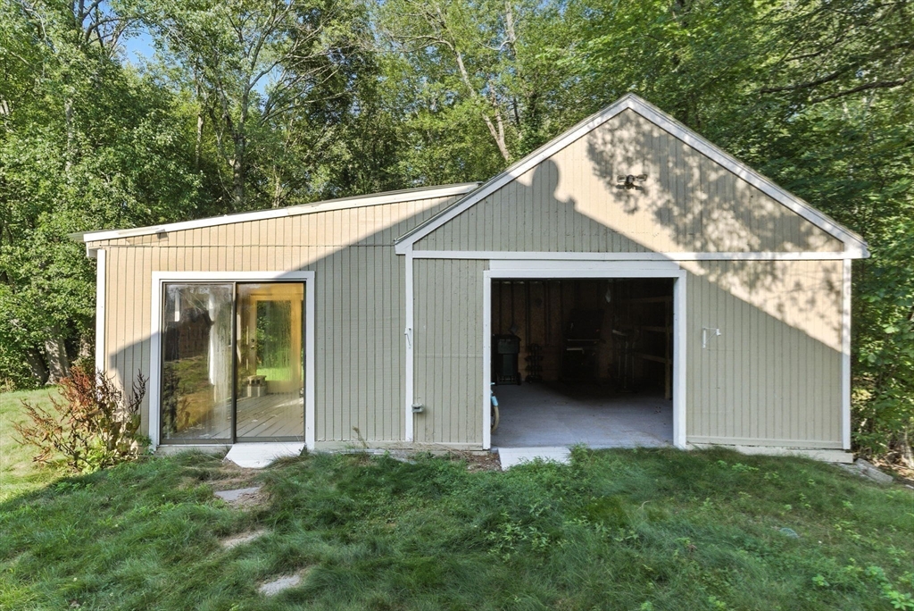18 Holly Road Holbrook, MA 02343 - Photo 22 of 28 a view of a house with a door and a yard