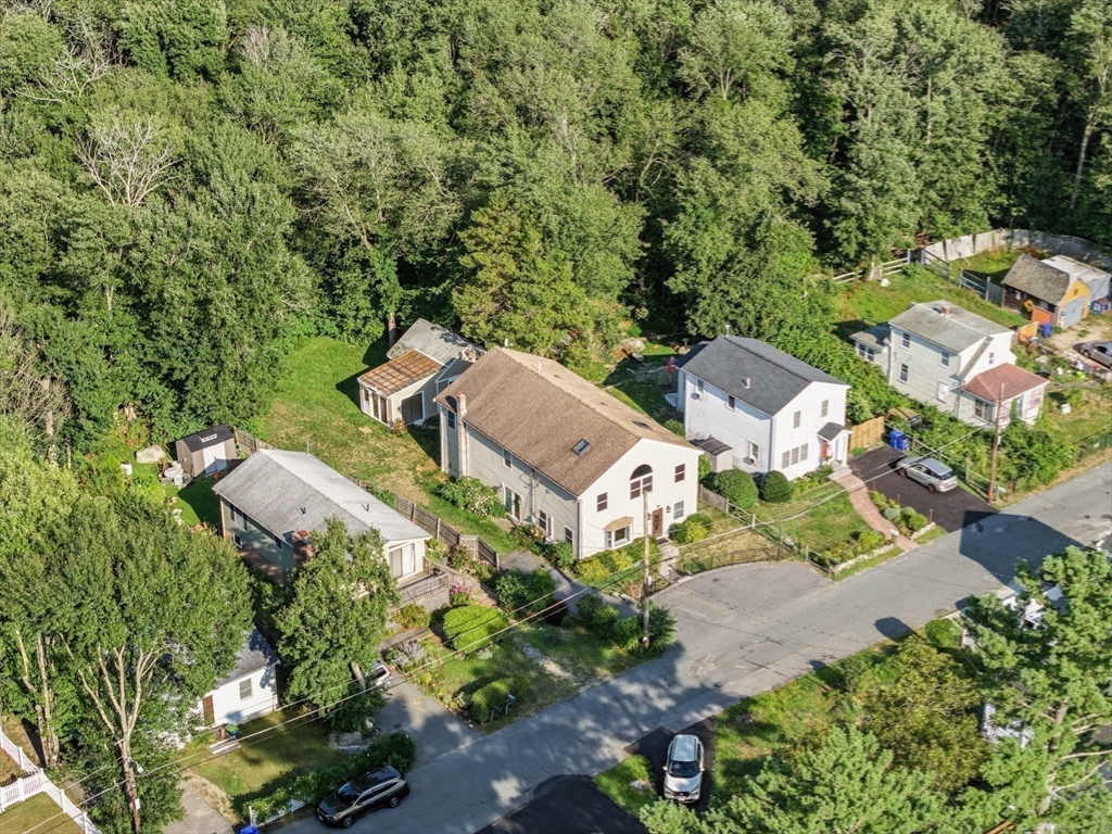 18 Holly Road Holbrook, MA 02343 - Photo 25 of 28 an aerial view of a house with a yard