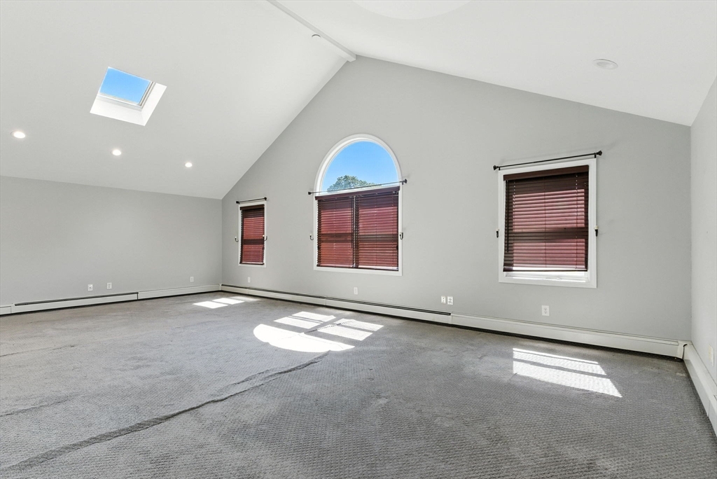 18 Holly Road Holbrook, MA 02343 - Photo 8 of 28 a view of an empty room with a window