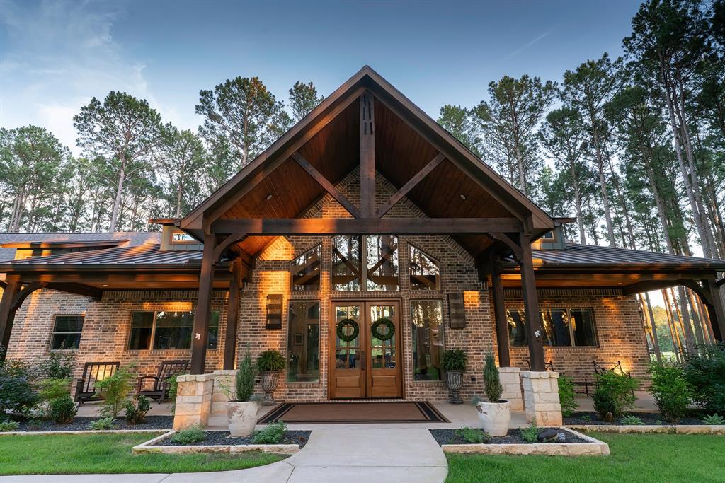 8595 Toler Pointe Larue, TX 75770 - Photo 1 of 40 Grand Resort style entry with high vaulted pine ceiling. Sees through to other side to the lake. Wings of the porch have space for porch swings.