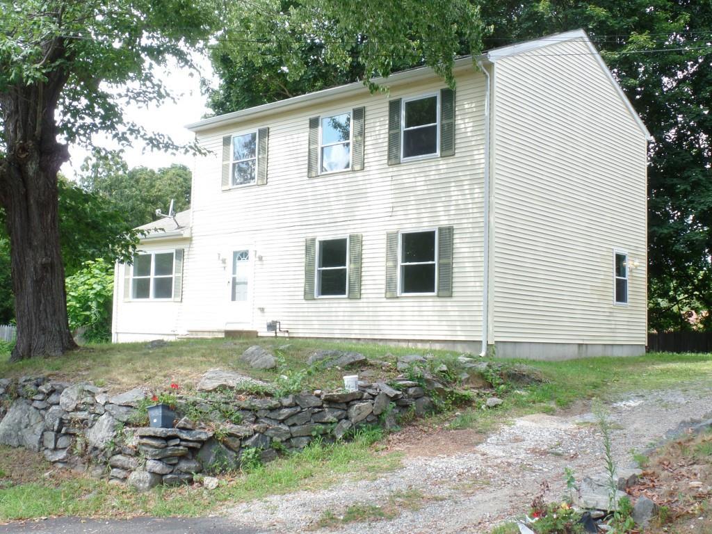 110 Corning Road Norwich, CT 06360 - Photo 1 of 1 Front - Right Side (Driveway shown here belongs to neighbor on the right)