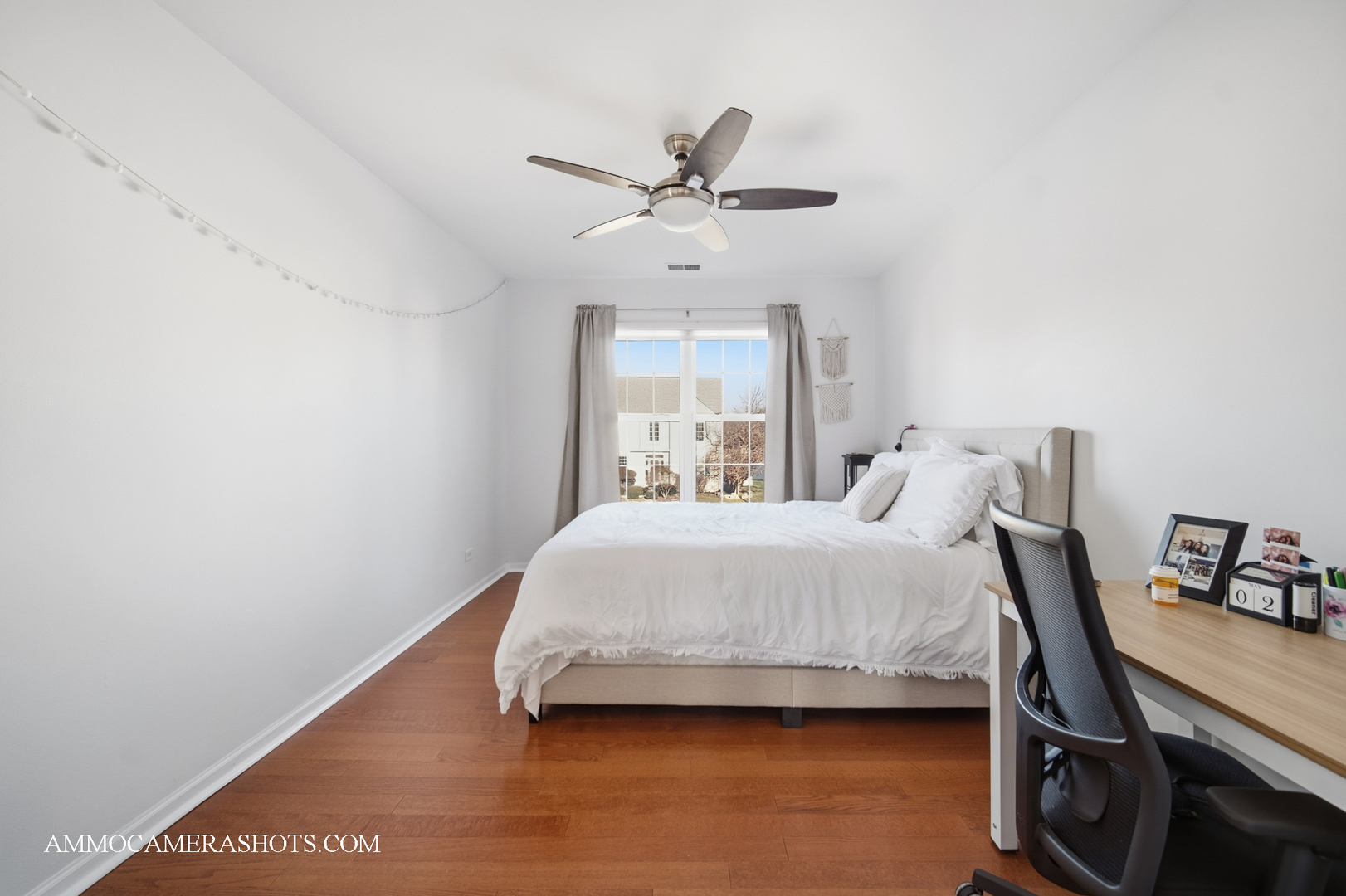 1205 Red Clover Drive Naperville, IL 60564 - Photo 27 of 49 a bedroom with a bed and window