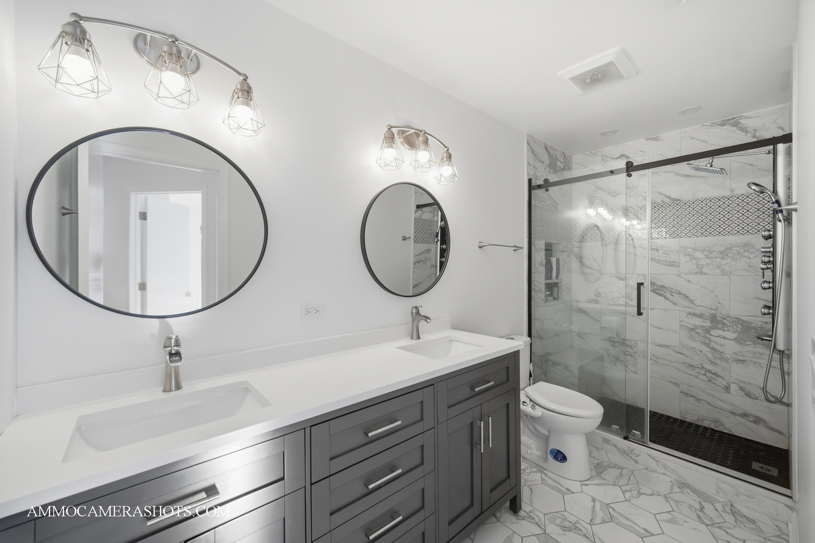 1205 Red Clover Drive Naperville, IL 60564 - Photo 29 of 49 a bathroom with a toilet sink and mirror