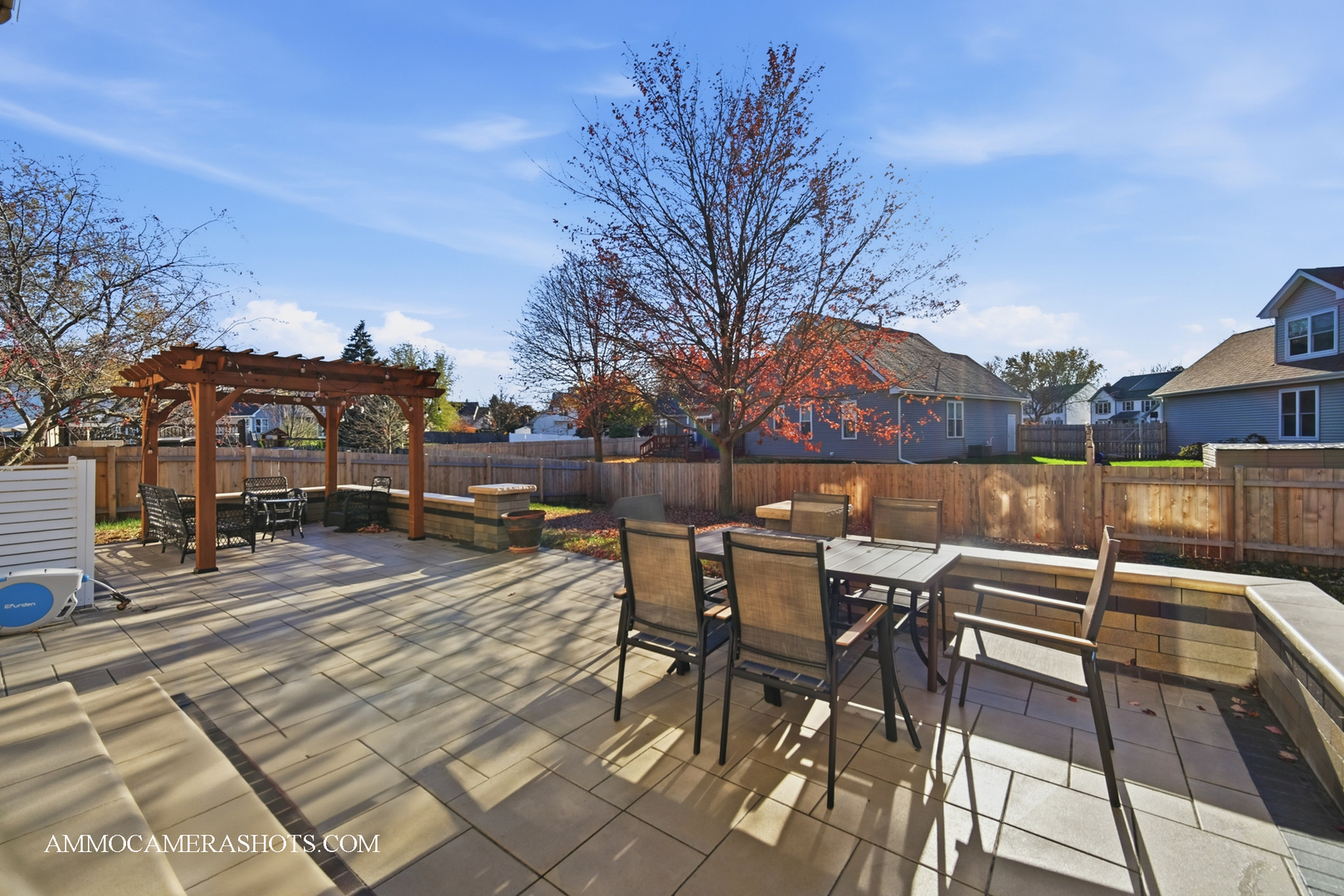 1205 Red Clover Drive Naperville, IL 60564 - Photo 35 of 49 a view of a patio with a table and chairs