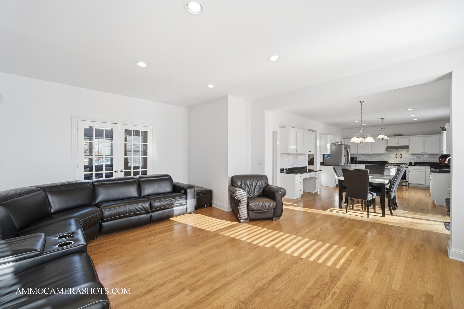1205 Red Clover Drive Naperville, IL 60564 - Photo 7 of 49 a living room with furniture a dining table and chairs with wooden floor
