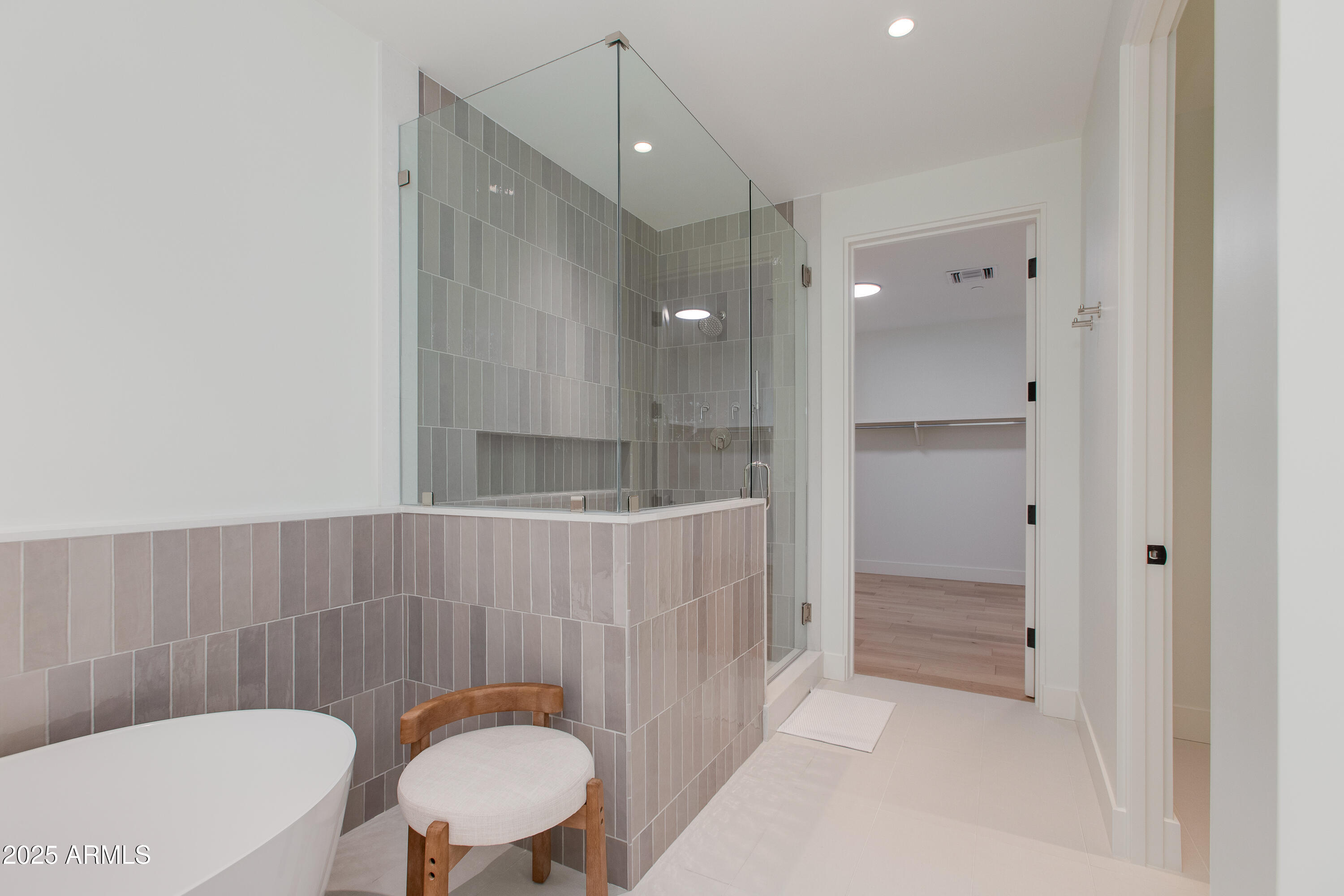 5000 North Camelback Ridge Drive, Unit 206 Scottsdale, AZ 85251 - Photo 35 of 62 a bathroom with a sink a toilet a mirror and shower