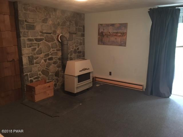 112 Colonia Road Milford, PA 18337 - Photo 10 of 16 Wood Stove/Family Room