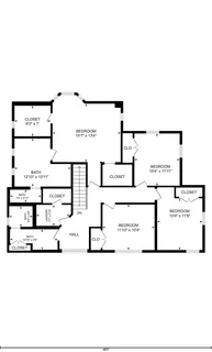 a black and white photo of a living room