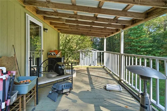 a view of a porch with furniture