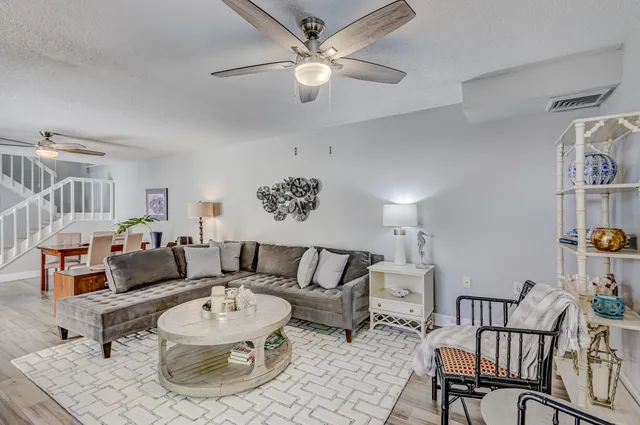a kitchen with a stove a sink and a refrigerator