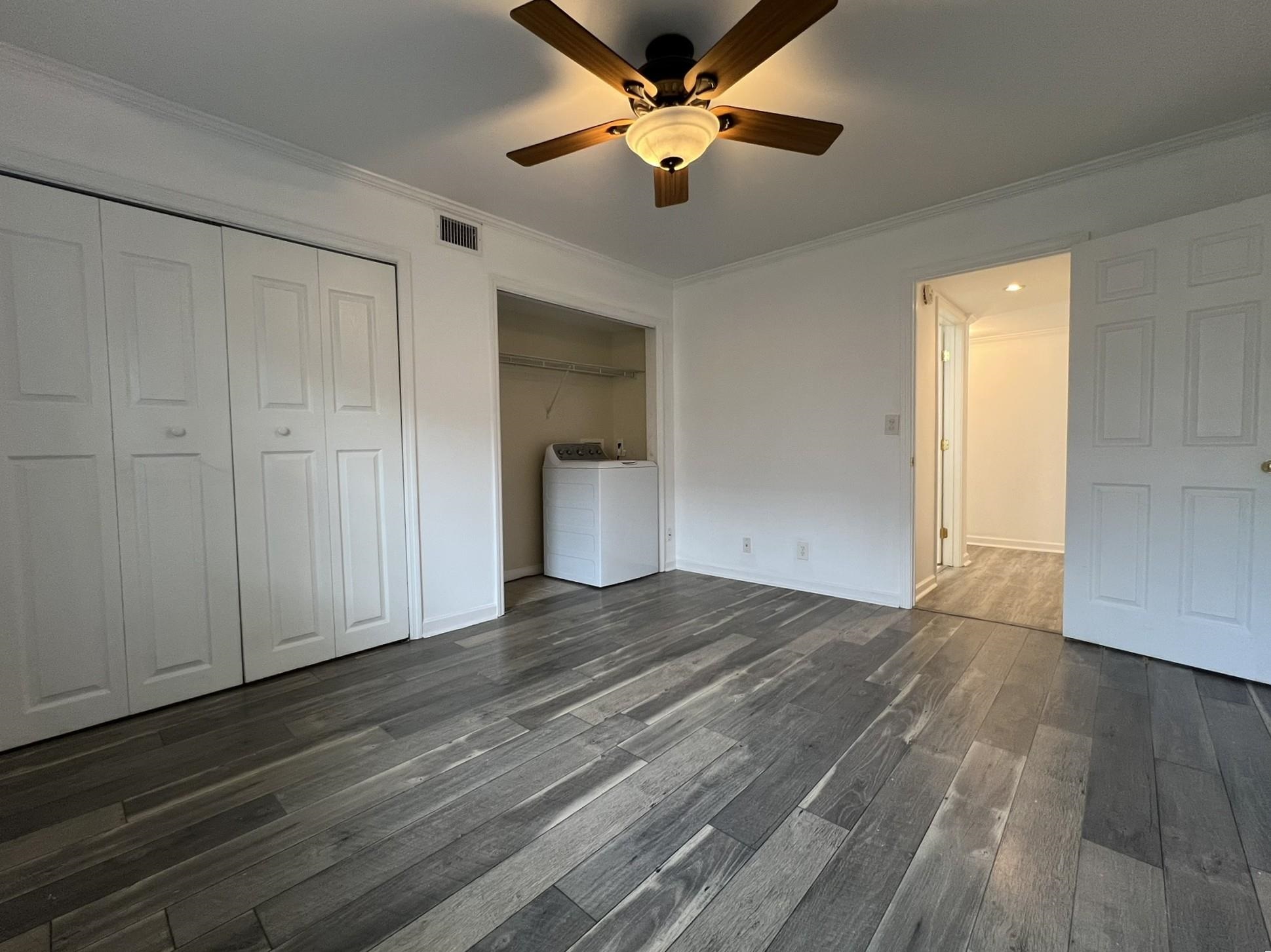 1207 Middle Court, Unit 102 Memphis, TN 38119 - Photo 20 of 31 wooden floor in an empty room