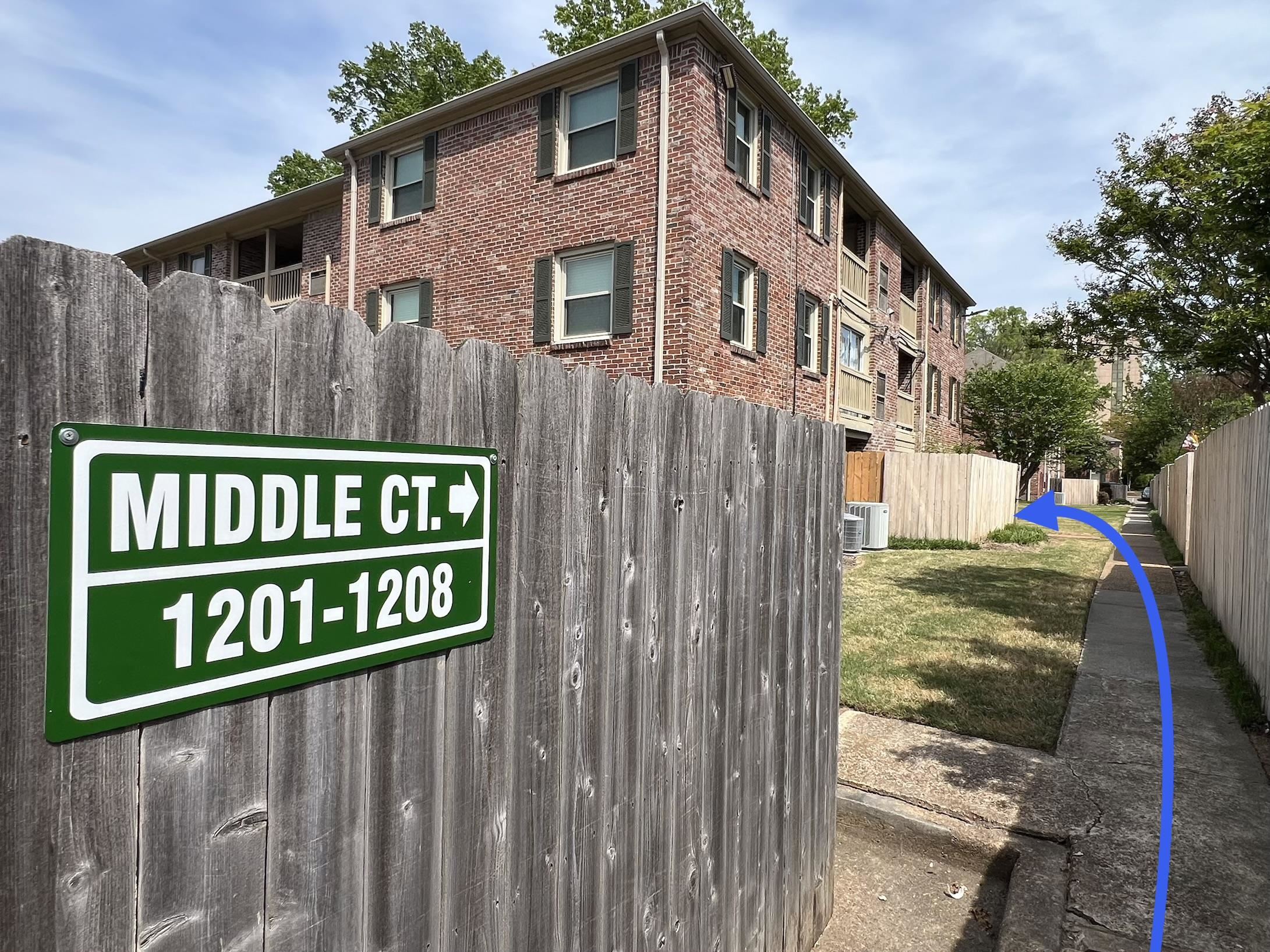 1207 Middle Court, Unit 102 Memphis, TN 38119 - Photo 28 of 31 a view of a house with backyard and trees