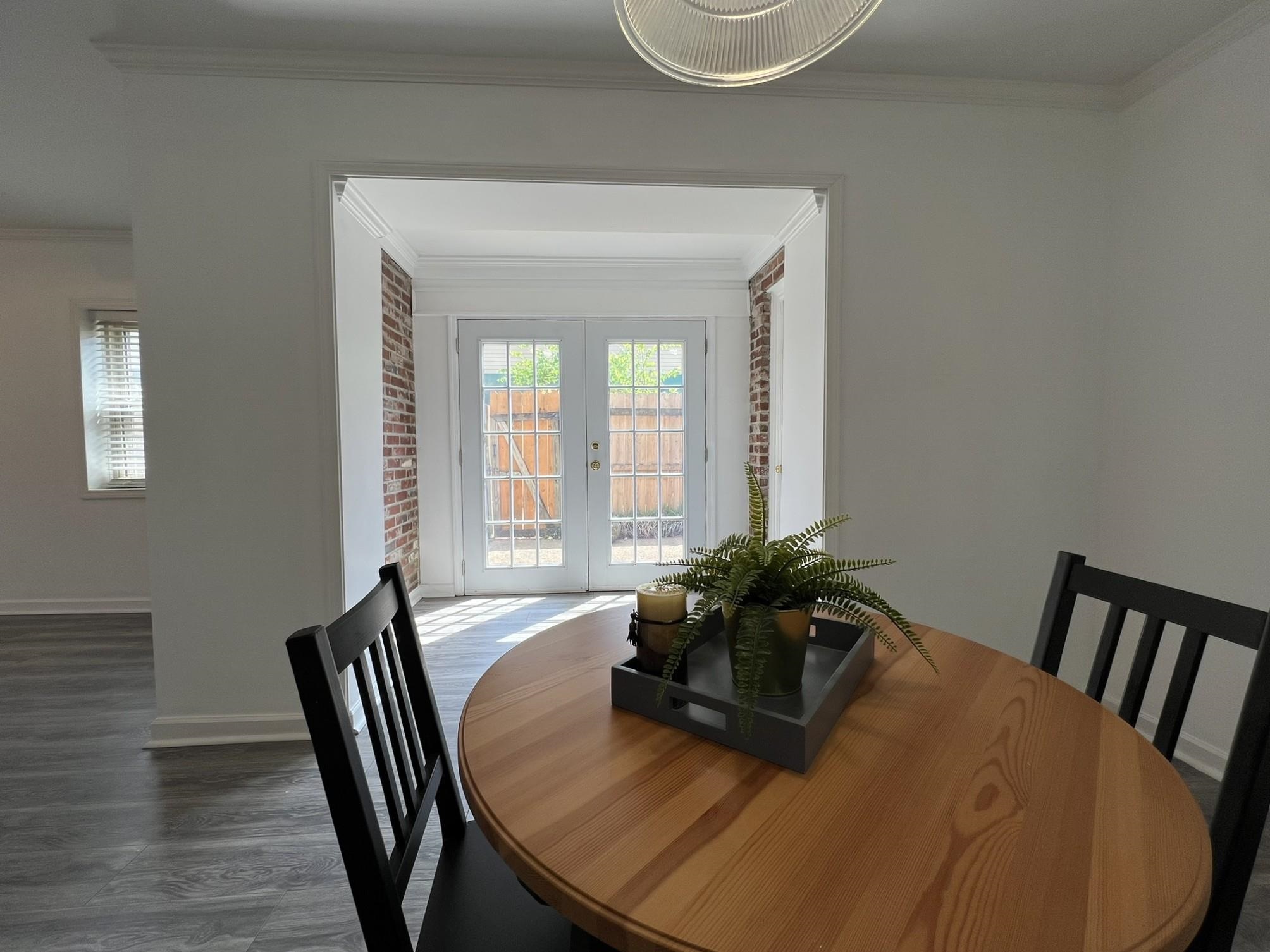 1207 Middle Court, Unit 102 Memphis, TN 38119 - Photo 6 of 31 a living room with furniture and wooden floor