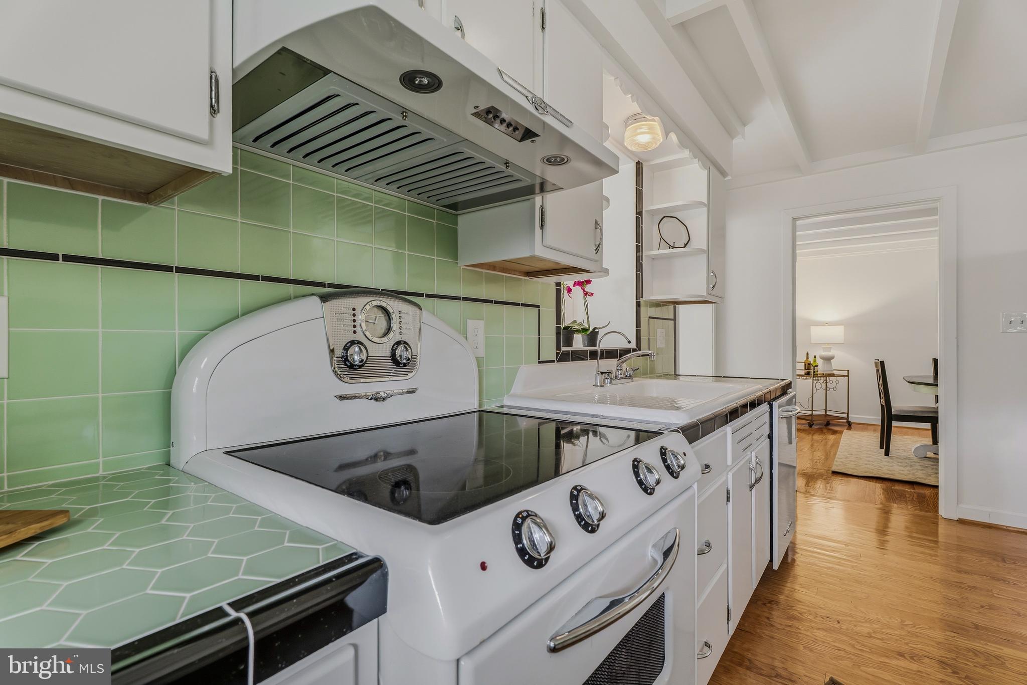 2425 Albert Rill Road Hampstead, MD 21074 - Photo 12 of 44 a kitchen with a stove and a sink