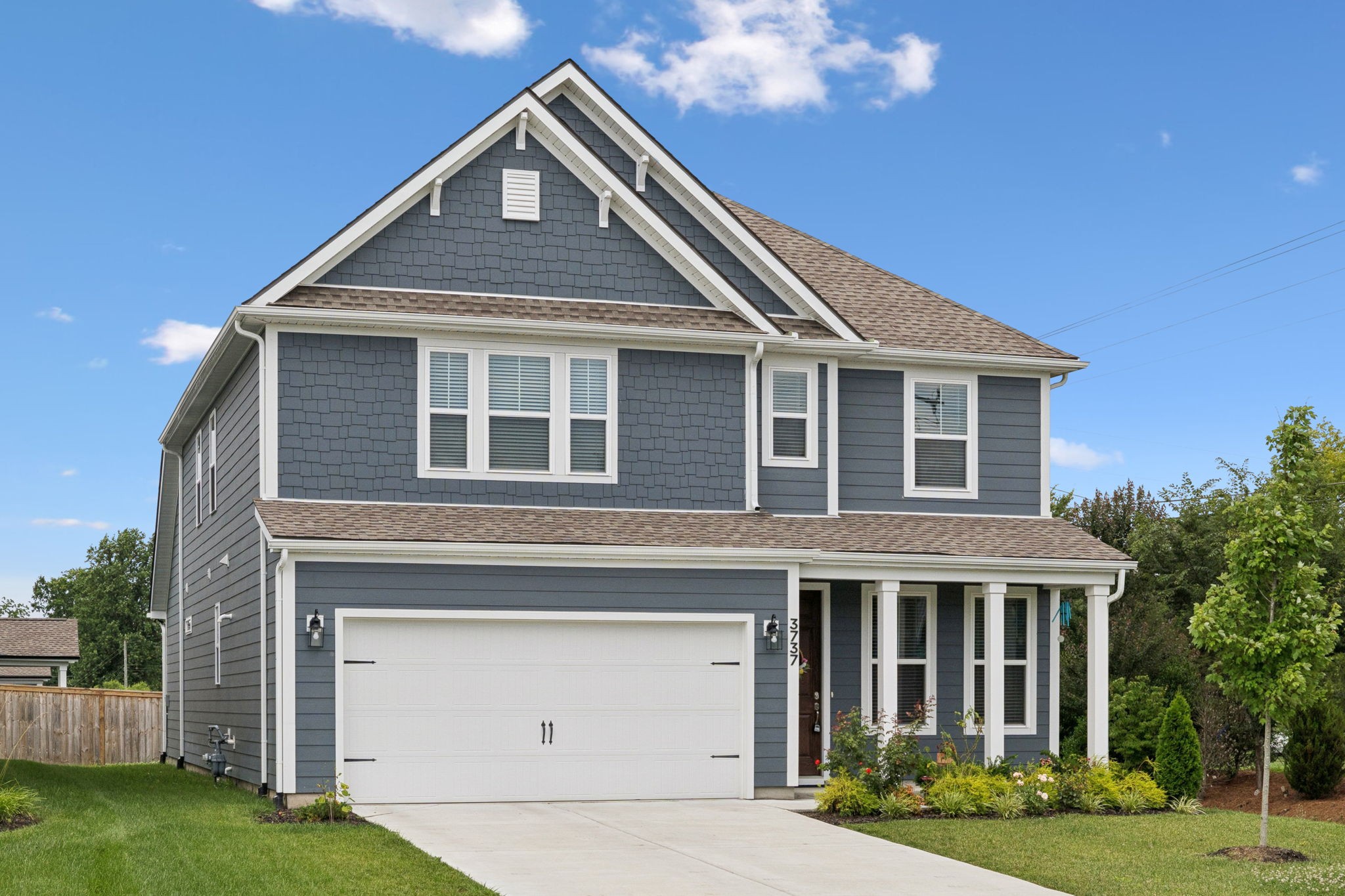 3737 Felipe Way Murfreesboro, TN 37129 - Photo 1 of 45 a front view of a house with garden