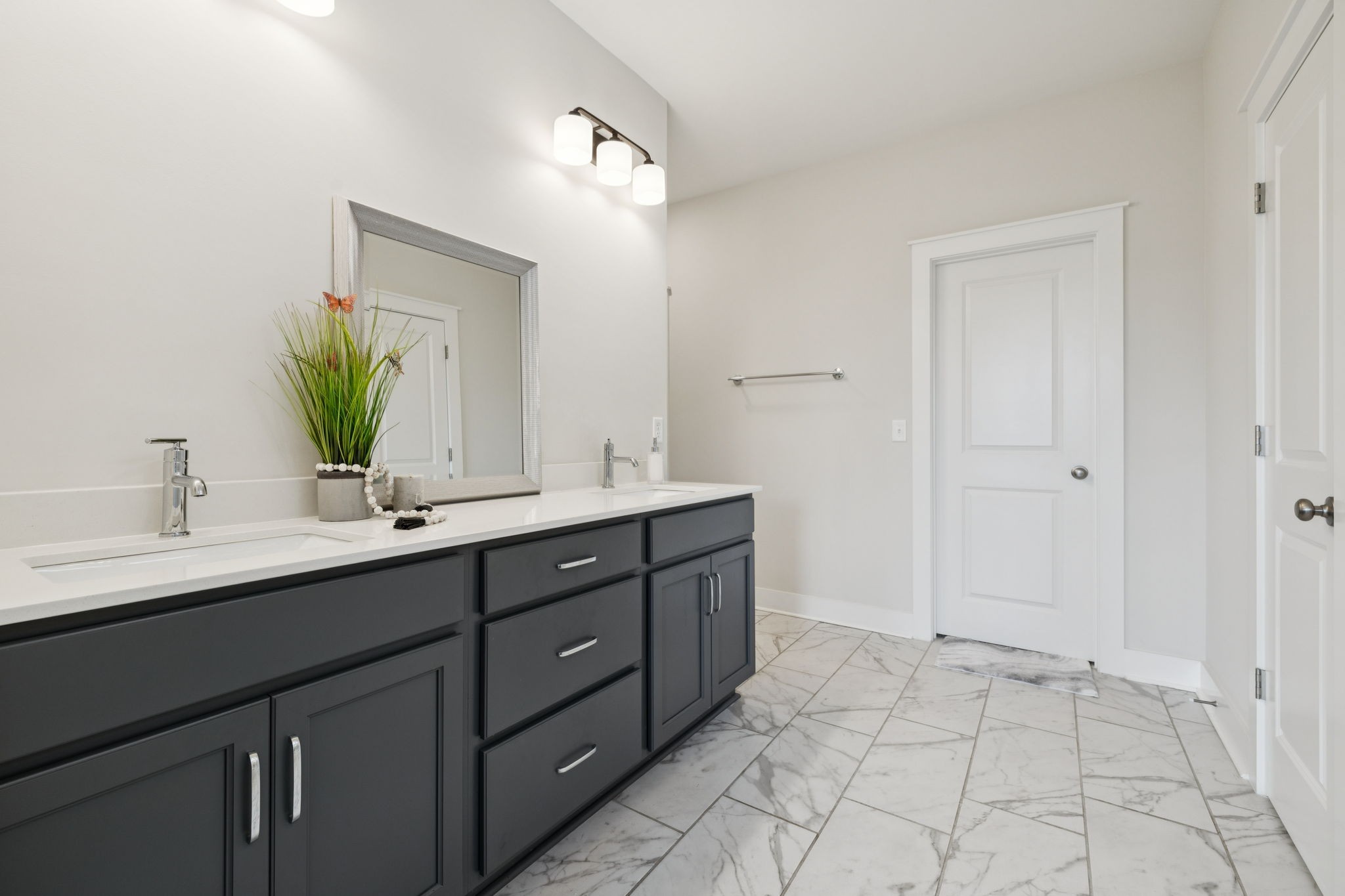 3737 Felipe Way Murfreesboro, TN 37129 - Photo 19 of 45 a bathroom with a double vanity sink and a mirror