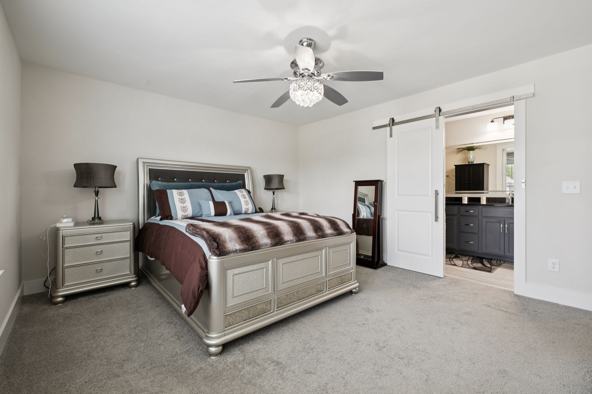 3737 Felipe Way Murfreesboro, TN 37129 - Photo 36 of 45 a spacious bedroom with a bed and a chandelier