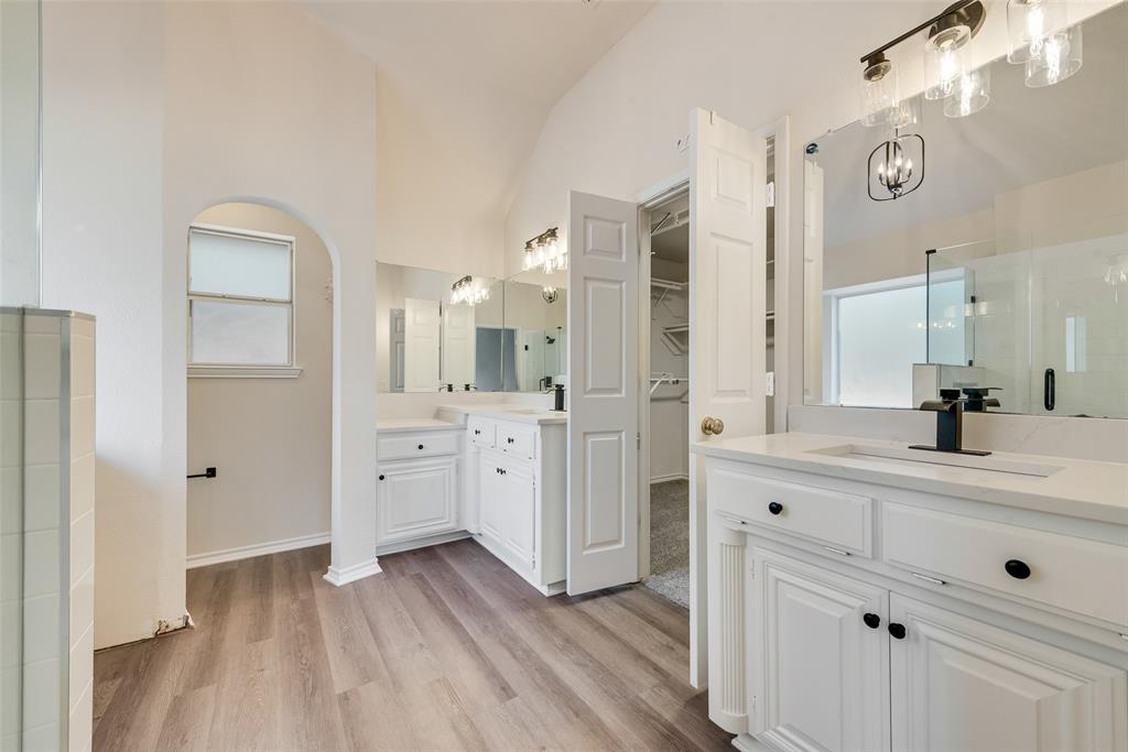 421 Roland Drive Keller, TX 76248 - Photo 29 of 40 a spacious bathroom with a double vanity sink mirror and shower
