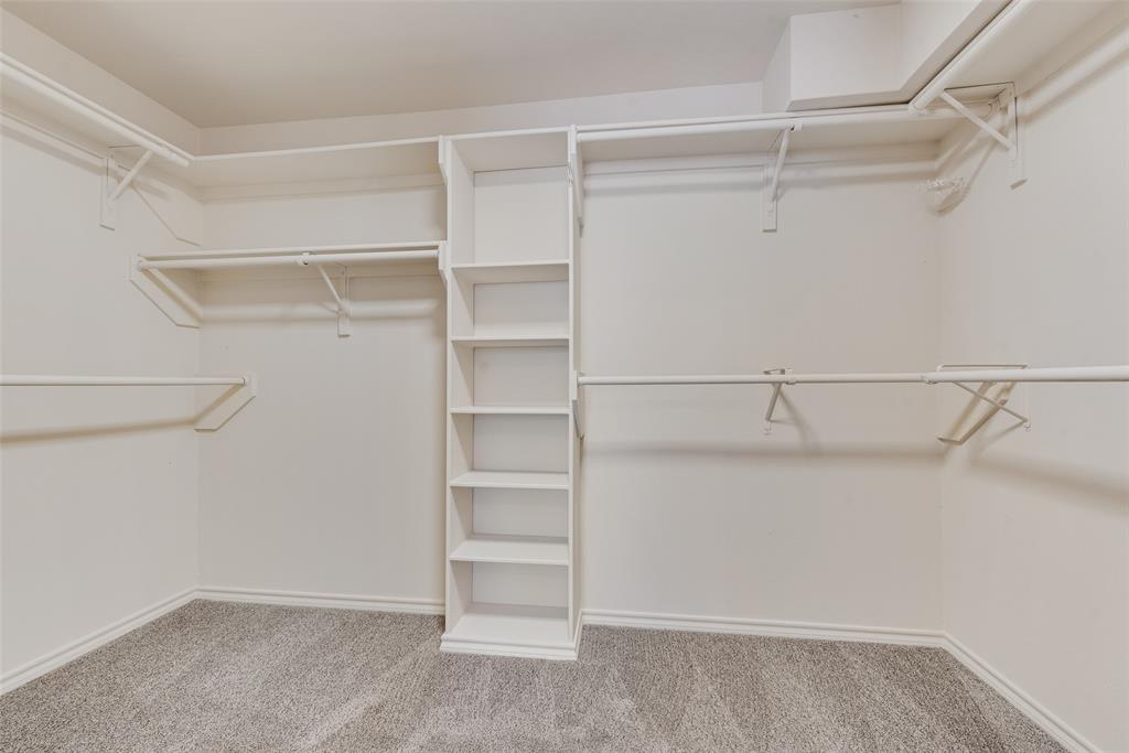 421 Roland Drive Keller, TX 76248 - Photo 31 of 40 a view of an empty walk in closet