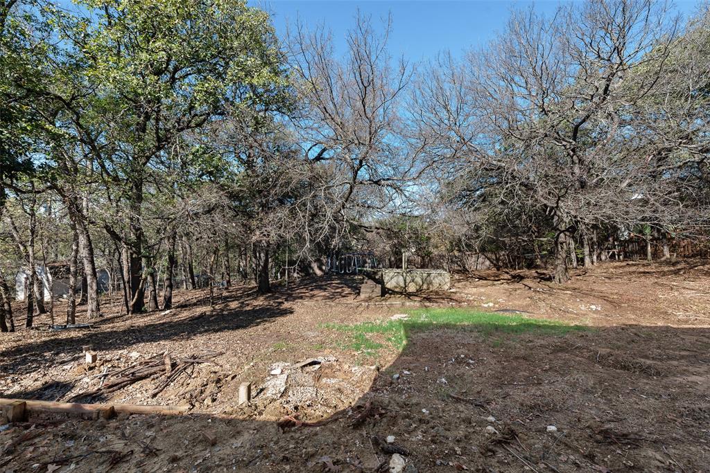 421 Roland Drive Keller, TX 76248 - Photo 35 of 40 a view of a yard with trees