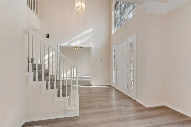 a view of entryway with wooden floor
