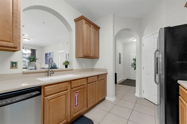 a view of a livingroom with furniture window and wooden floor