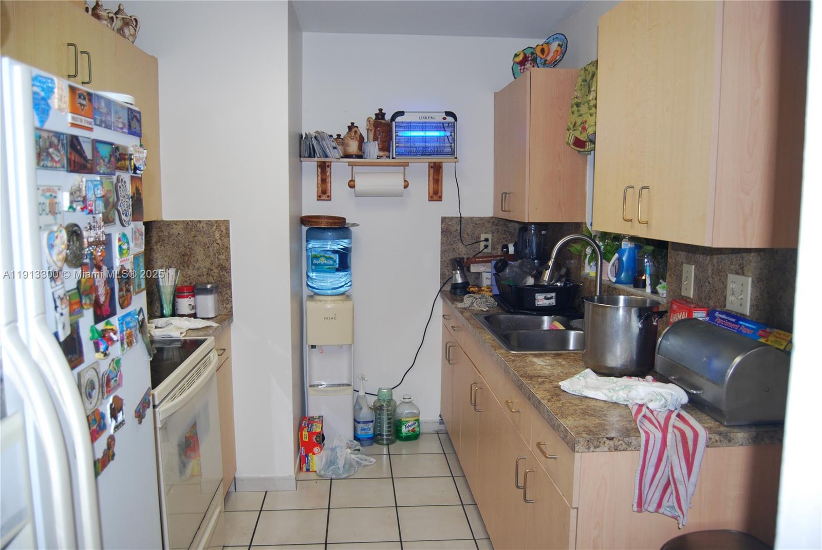 950 Southwest 13th Court Miami, FL 33135 - Photo 6 of 10 a room with storage and utility