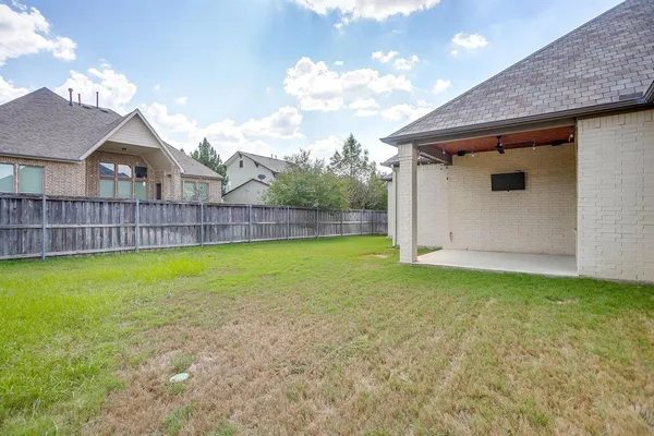 a view of a backyard with a garden