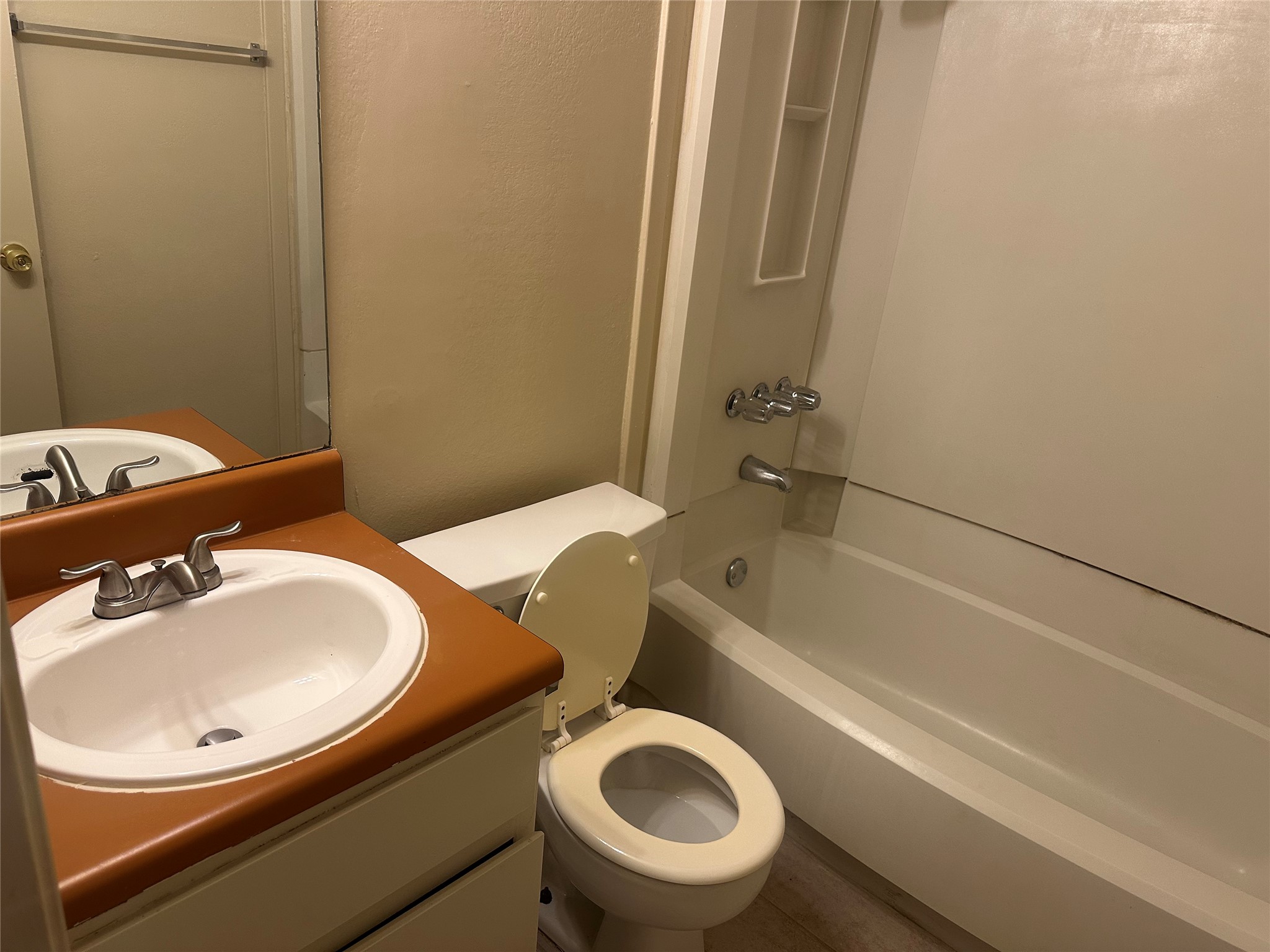 2602 South Bagdad Road, Unit A Leander, TX 78641 - Photo 11 of 26 Functional full bathroom featuring a tub-shower combo and a vanity with an integrated sink.