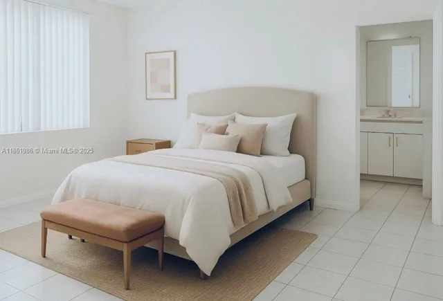 a bedroom with a bed and cabinet