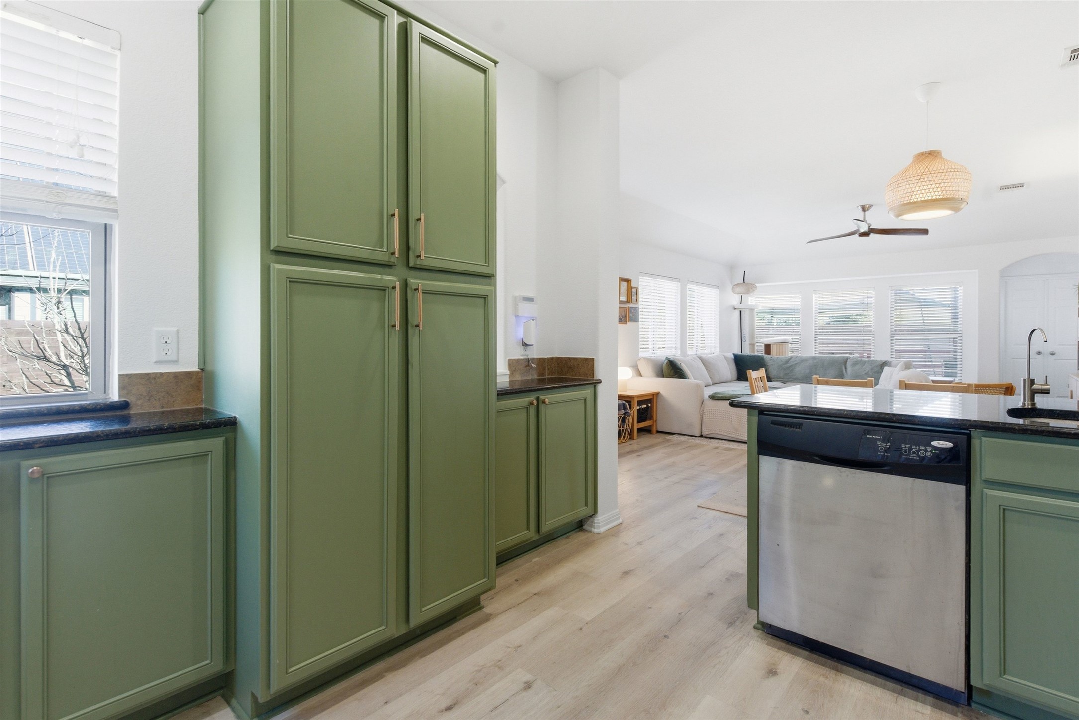2513 Winchell Lane Austin, TX 78725 - Photo 6 of 23 a kitchen with a refrigerator and cabinets