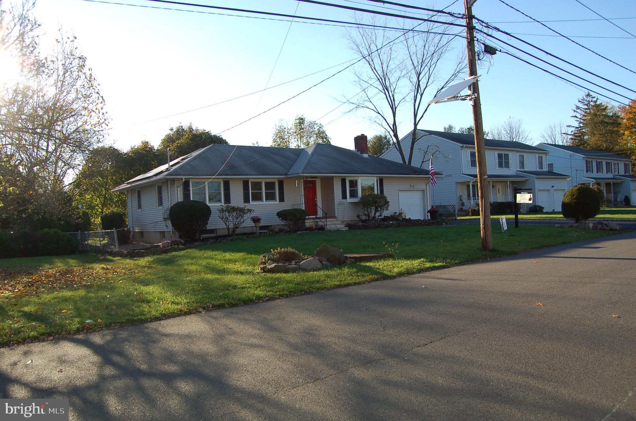 1482 Huron Road North Brunswick, NJ 08902 - Photo 1 of 17 a view of house with a yard