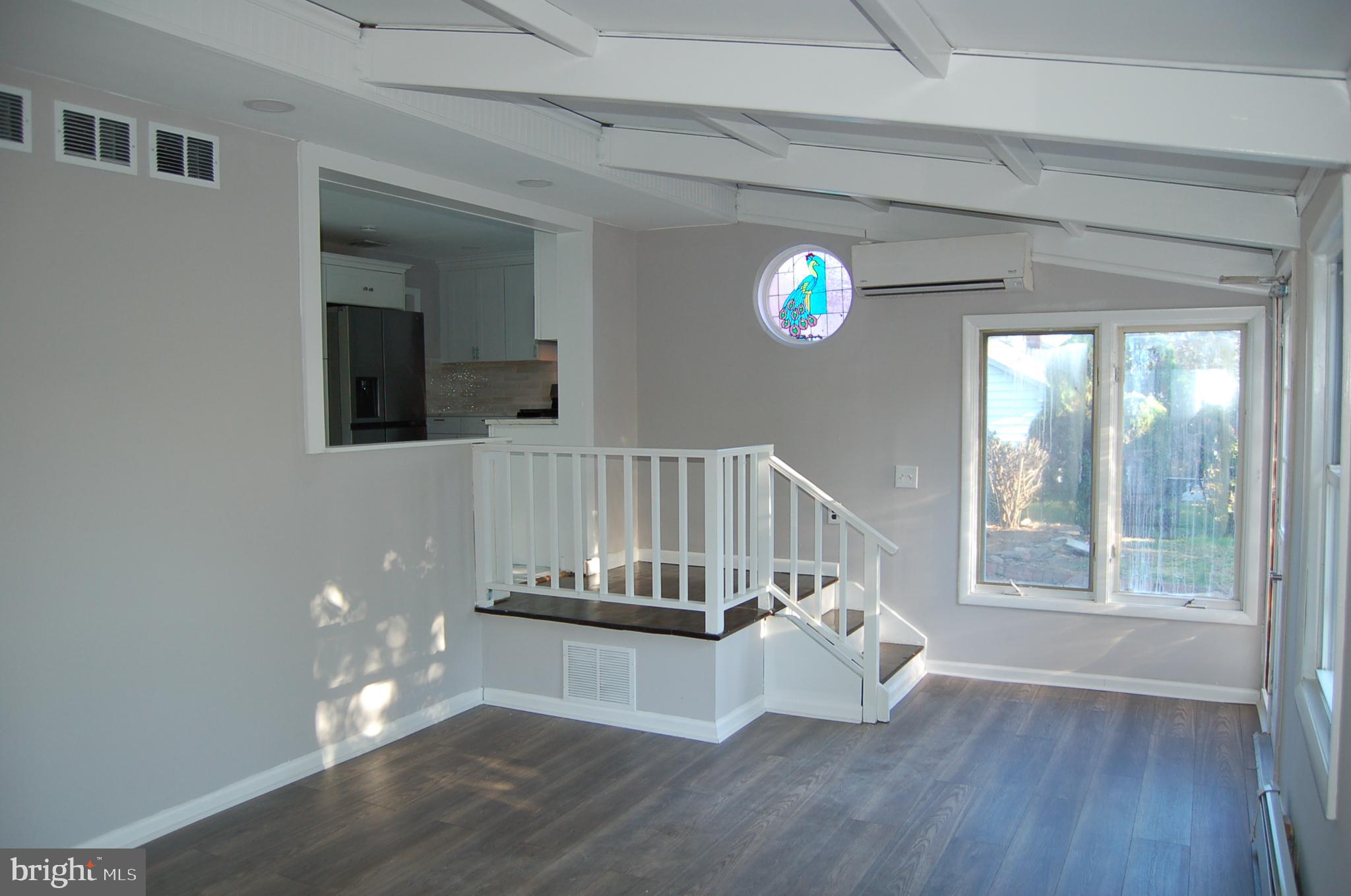 1482 Huron Road North Brunswick, NJ 08902 - Photo 12 of 17 a view of livingroom with furniture and wooden floor