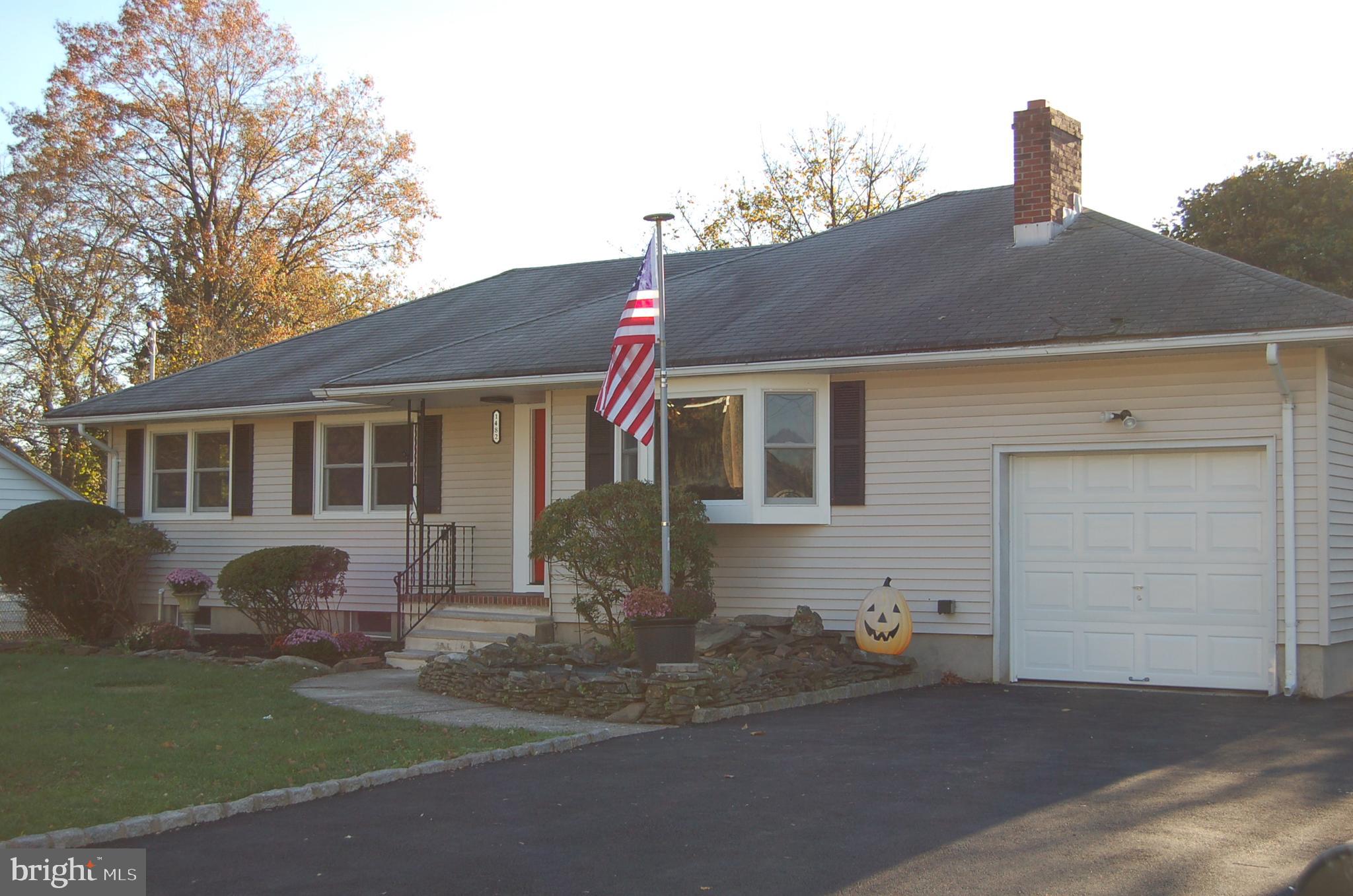 1482 Huron Road North Brunswick, NJ 08902 - Photo 3 of 17 a front view of a house with a yard