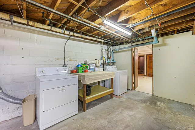 a utility room with cabinets