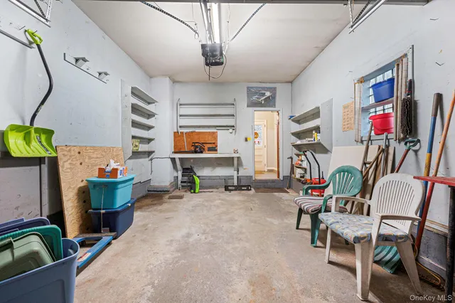 a room with furniture and a flat screen tv