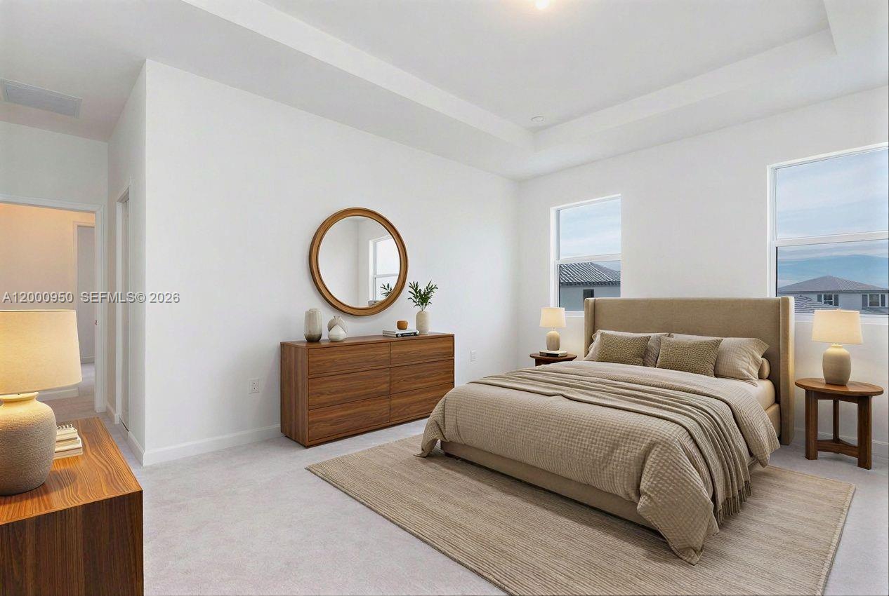 2636 Southeast 8th Court Homestead, FL 33035 - Photo 20 of 34 a bedroom with a bed and a dresser
