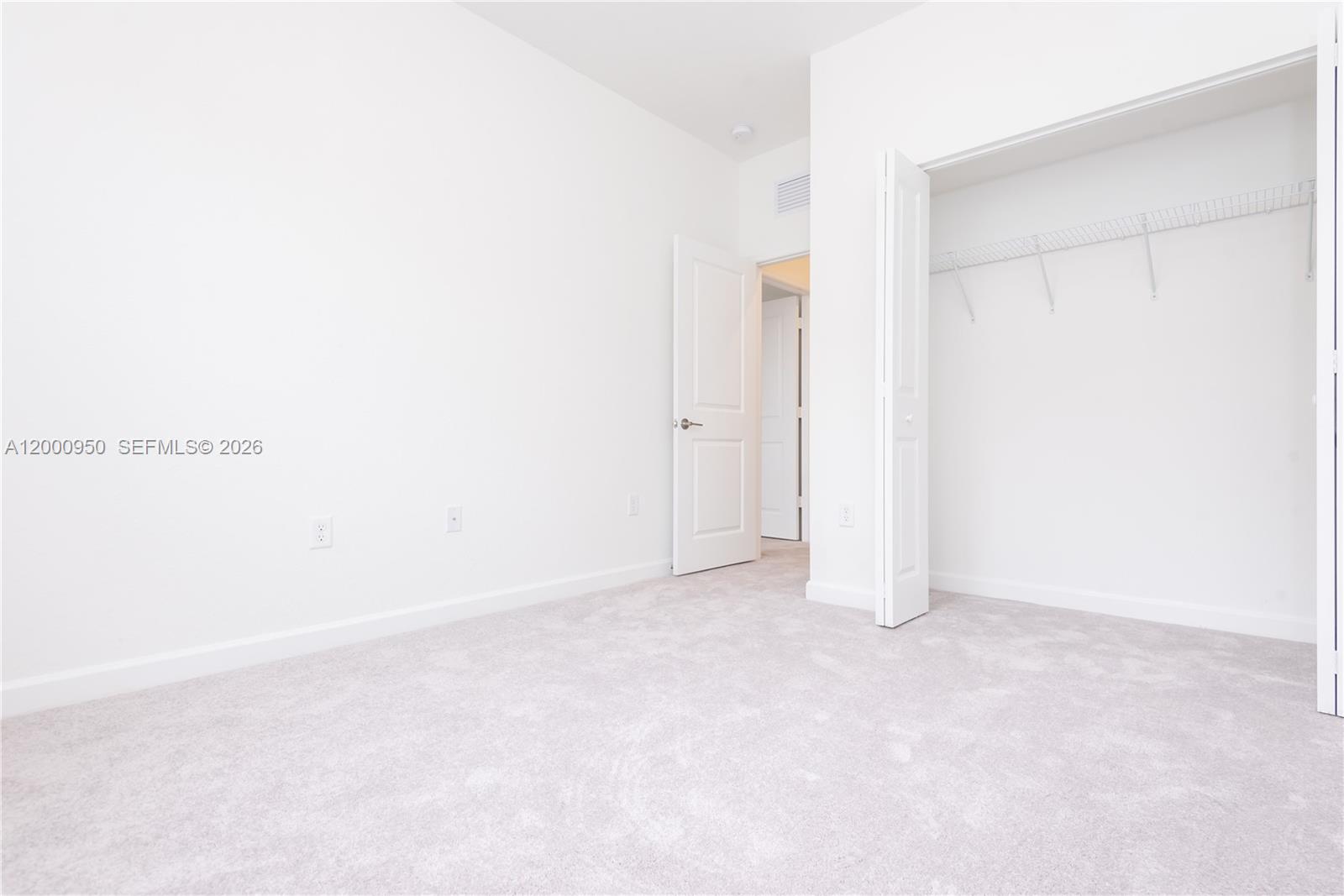 2636 Southeast 8th Court Homestead, FL 33035 - Photo 27 of 34 a view of an empty room