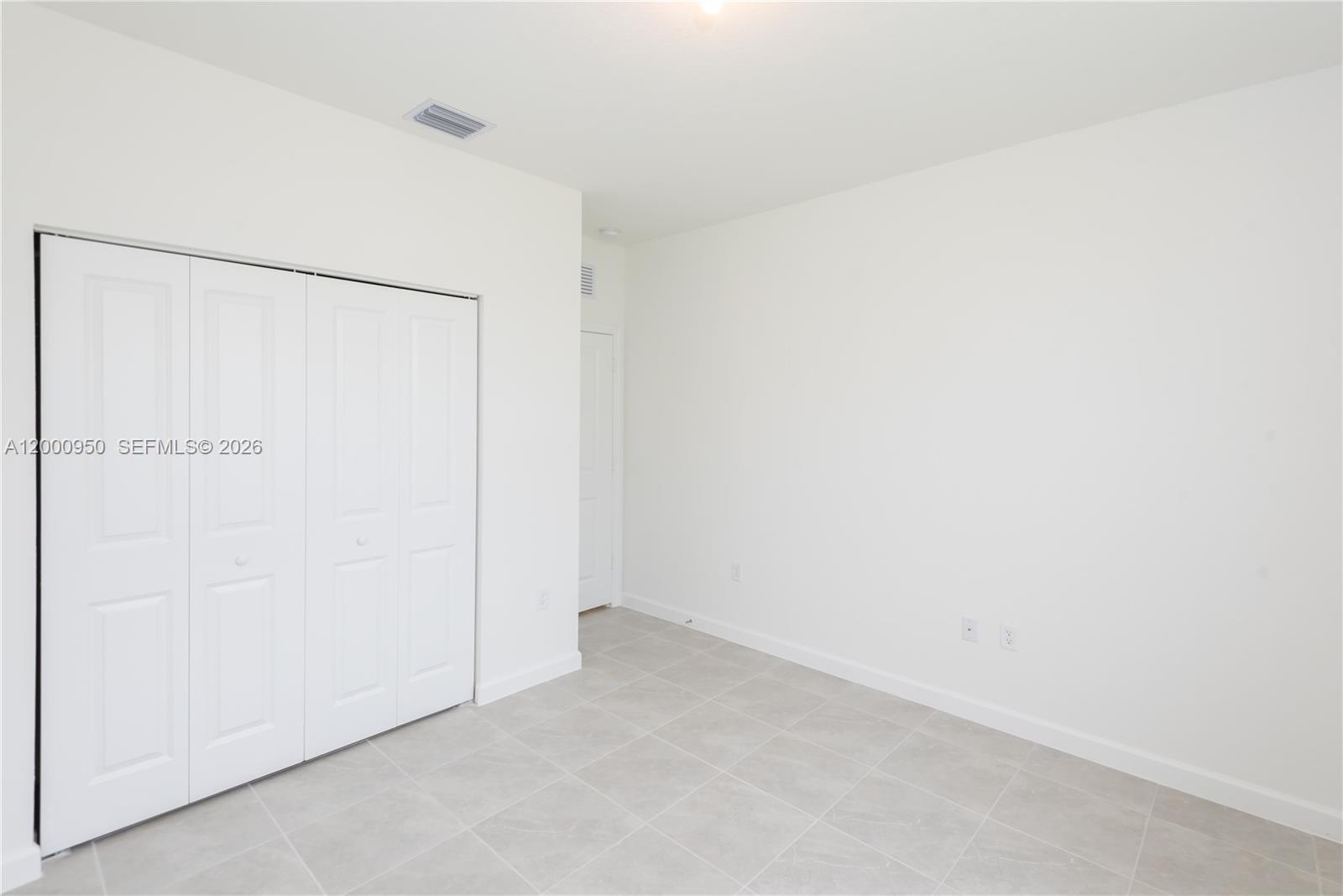 2636 Southeast 8th Court Homestead, FL 33035 - Photo 9 of 34 a view of an empty room