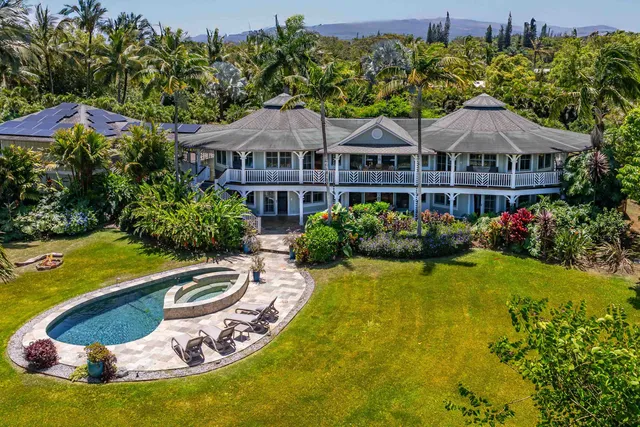 a view of a swimming pool with a garden