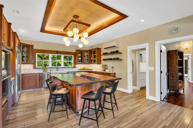 a view of a dining room with furniture and window