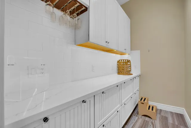 a bathroom with a sink and mirror