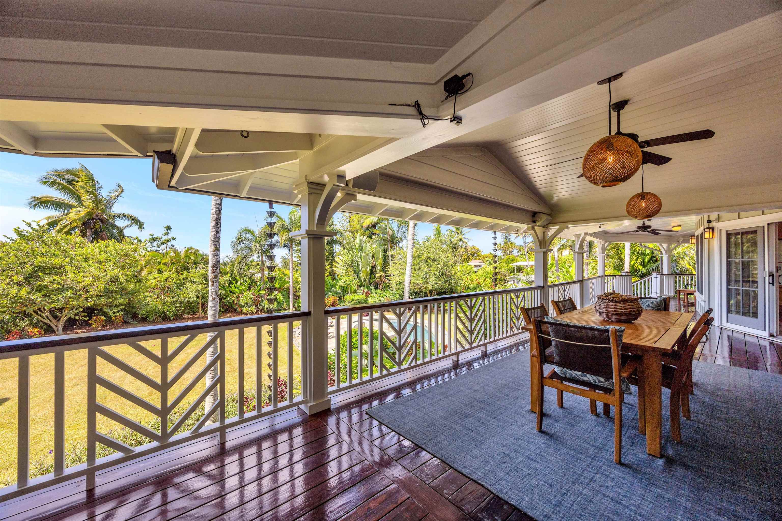 65 North Holokai Road Haiku, HI 96708 - Photo 19 of 50 a view of a porch with furniture and a yard