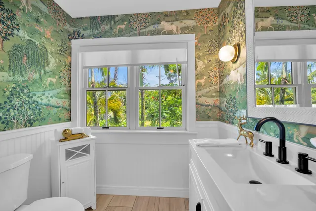 a bathroom with a sink a toilet and a bathtub