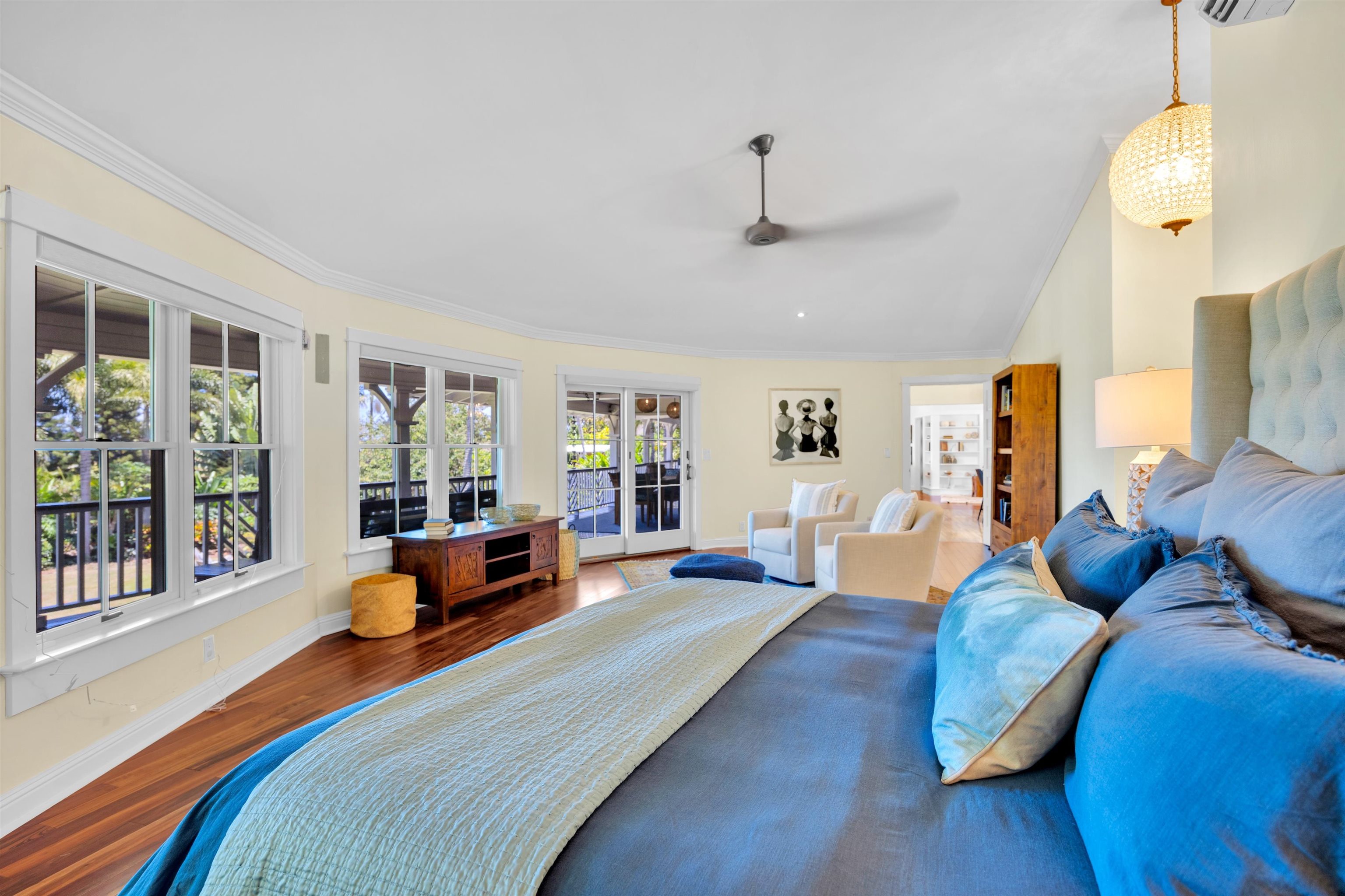 65 North Holokai Road Haiku, HI 96708 - Photo 22 of 50 a bedroom with furniture and a large window