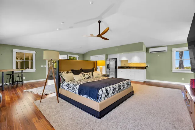 a view of a kitchen with wooden floor